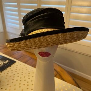 Gorgeous large wicker and black hat. Derby day!